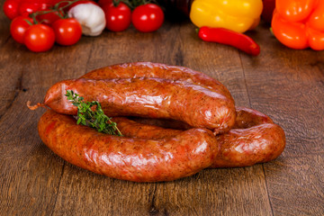 Pork sausages over wooden