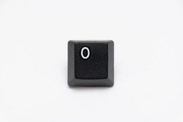 Single black keys of keyboard with different letters O