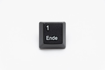 Single black keys of keyboard with different letters one