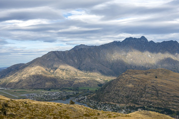 The Remarkables with Queestown airport in the valley