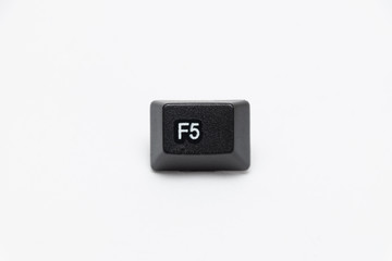 Single black keys of keyboard with different letters F5