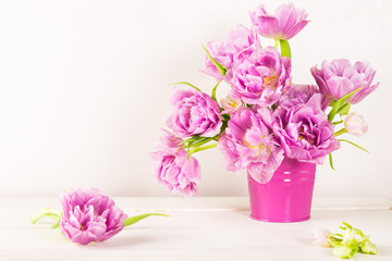 Fototapeta na wymiar Beautiful Bunch of Peony Style Tulips in the Pink Pot