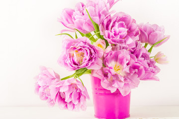 Fototapeta na wymiar Beautiful Bunch of Peony Style Tulips in the Pink Pot