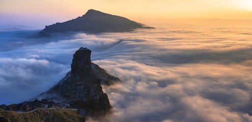 Fanjingshan, Sea of Clouds, Sunset above the Clouds at Mount Fanjing Nature Reserve - Guizhou Province, China. Summit in the clouds. UNESCO World Heritage List, China National Parks