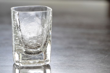 Cracked shot glass