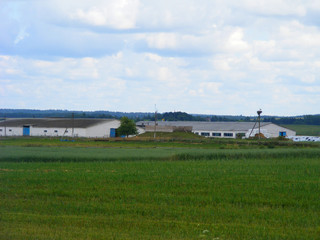 old farm in Belarus, view from field