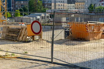 construction site with a fence and entrance prohibition sign 