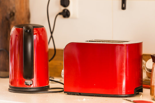 Electric kettle and toster on kitchen table
