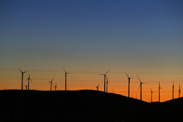 Fototapeta premium Many big windmills are on the mountains