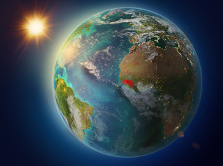 Guinea with sunset on Earth