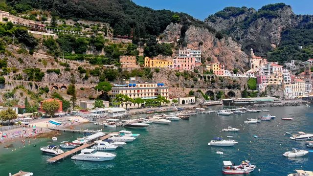 Flying along the Amalfi coast to Positano Sorrento, beautiful old traditional town. Italy. Aerial drone view