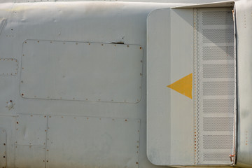 Old detail of a military aircraft, metal texture
