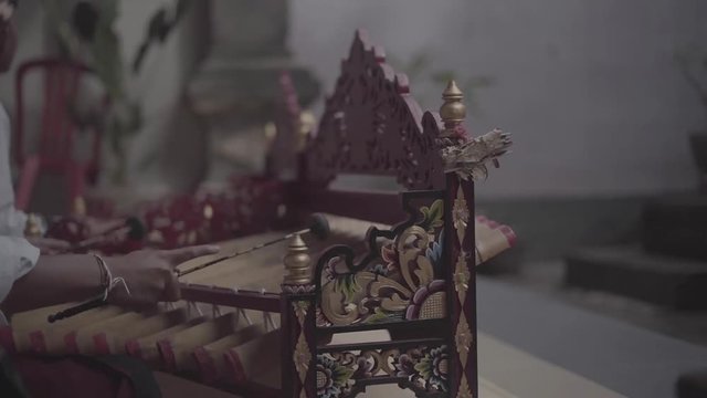 Balinese bamboo music called rindik, often used for entertainment and ceremonial purposes.