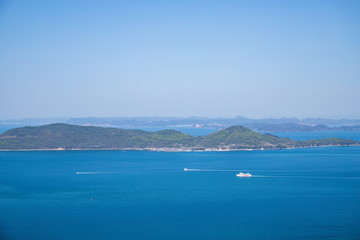 Fototapeta na wymiar Seascape of the Seto Inland Sea,islands and ferryboat,Yashima,Shikoku,Japan
