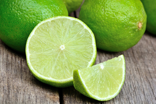 Freshness limes on a wood table