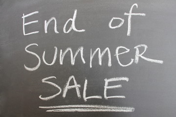 'End of Summer Sale' handwritten text on a blackboard.