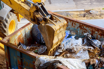 Fototapeta premium refuse disposal with excavator shovel construction site