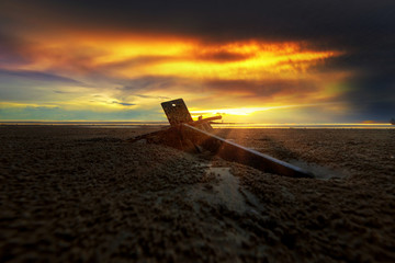 The view of the anchor on the sand.