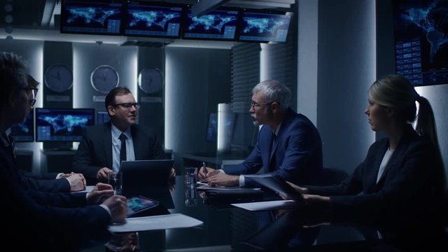 Corporate Executives Have a Closed Meeting With the Goverment Officials in the Negotiations Room. Serious Business People Solving Problems.