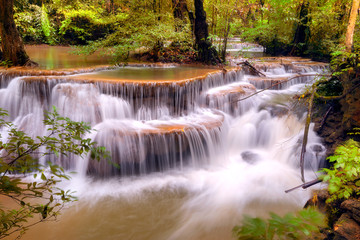 Fototapeta na wymiar Waterfall in deep forest Huai Mae Khamin Waterfall , Kanchanaburi Thailand is popular with waterfall tourists . 