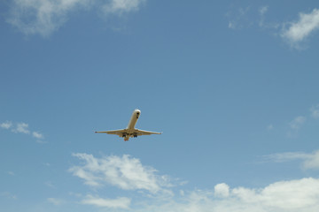 Airplane against sky