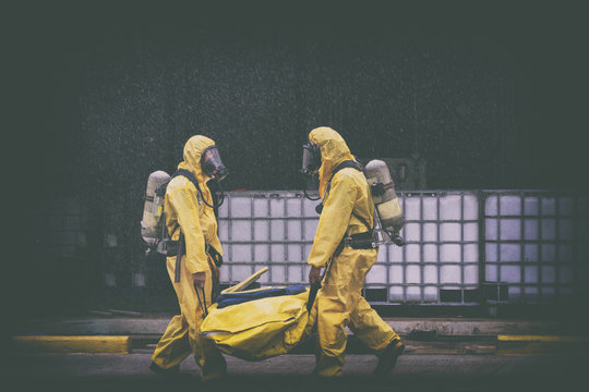 chemical spill pollution response team in action recovery stop spill of the chemical spill pollution at factory . Hazard emergency response concept 