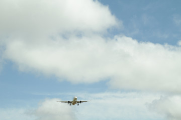 Airplane against sky