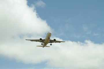 Airplane against sky