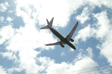 Airplane against sky