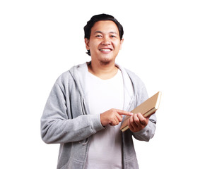 Naklejka na ściany i meble Young Man Holding a Book, Smiling Expression