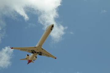 Airplane against sky