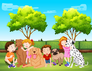 Obraz na płótnie Canvas Children and dog at the park