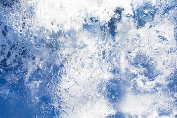 The texture of the ice. The frozen water.Winter background    