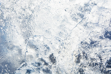 The texture of the ice. The frozen water.Winter background    