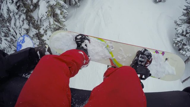 Snowboarder Riding Chairlift First Person Perspective