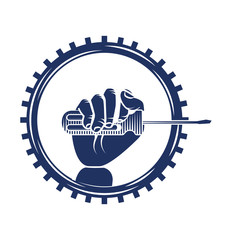 hand holding screwdriver on gear engine mechanical