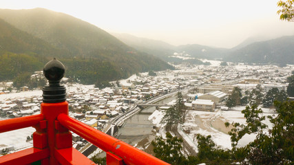 A view of tsuwano from a shinto shrine in the midst of a heavy snow impresses the visitor.