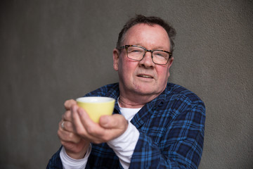 Senior Man at Outdoor Cafe