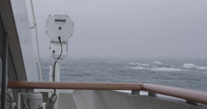 Slow motion imagery of crossing the Drake Passage to Antarctica in a storm. A dramatic scene with heavy wind and big waves. Shot in 4k with RED Epic Dragon.