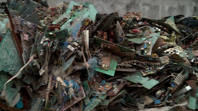 close-up on a Mountain of electronic waste in Abidjan, Africa - E-waste from Old Computers and Equipements, is a major concern to ecologists around the world.