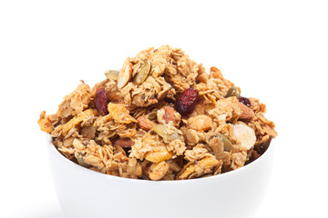 Close up Granola on white bowl isolated on white background.