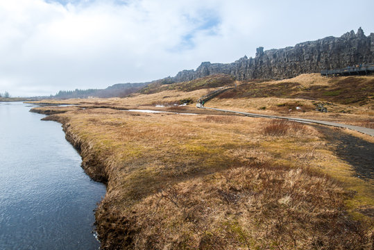 Scenery view of the high rock wall of Logberg (Law Rock) of Thingvellir national park the Unesco world heritage site in Iceland.