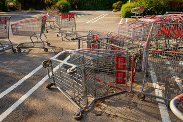 Upside down shopping carriages, trolleys in the street. Street violence concept