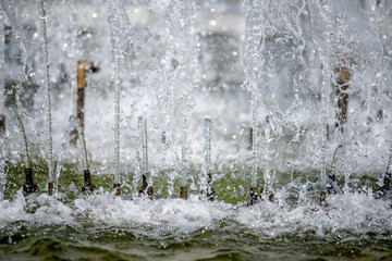 Water splashes in the fountain shot close-up 
