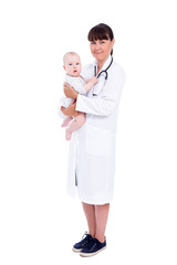 full length portrait of female doctor pediatrician with little baby patient isolated on white