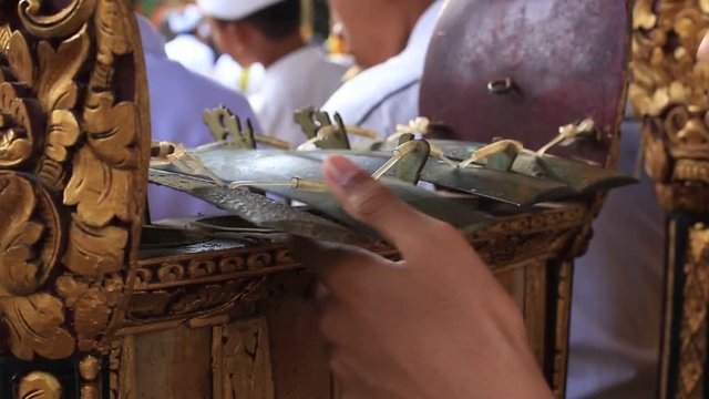 Indonesian children musicians at holy temple during the religious ceremony in Ubud, island Bali, Indonesia