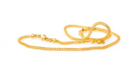 Golden necklace isolated on white background