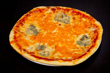 Delicious 4 cheese pizza