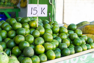Fresh mandarins are selling on a local fruit market of Bali, Indonesia
