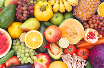 Mixed fresh colorful fruits and vegetables as healthy and natural food with vitamins